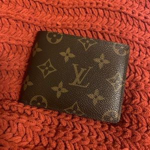 SOLD LOUIS VUITTON MONOGRAM MULTIPLE WALLET